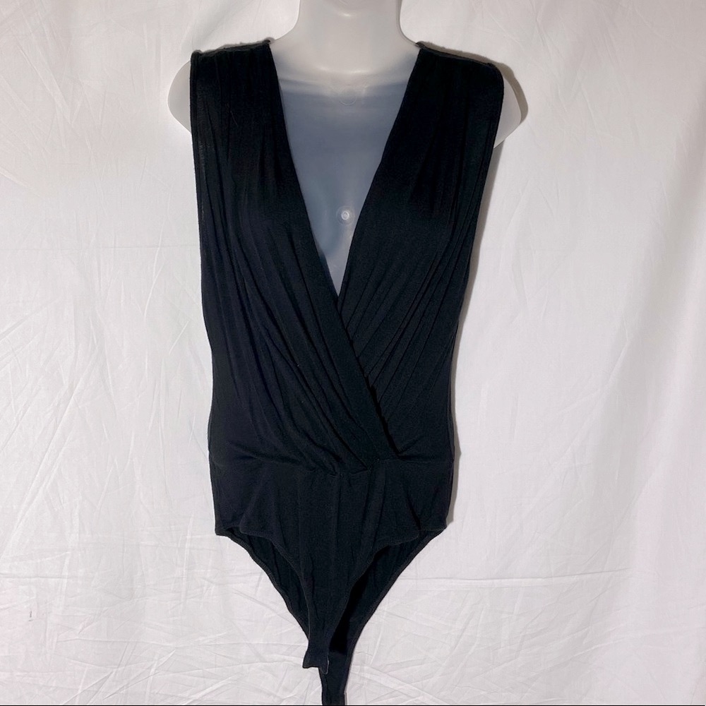 Stella Luce Black Body Suit. Size Large. Snap Closure.